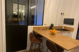 Rénovation et aménagement d’intérieur d’une maison sur Courseulles sur Mer avec la réalisation par Laro