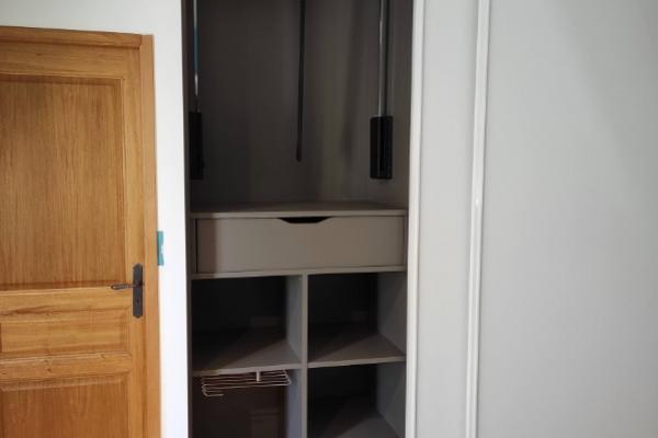 UN DRESSING SUR-MESURE SOUS PENTE PAR LARO AMENAGEMENT D'INTERIEUR